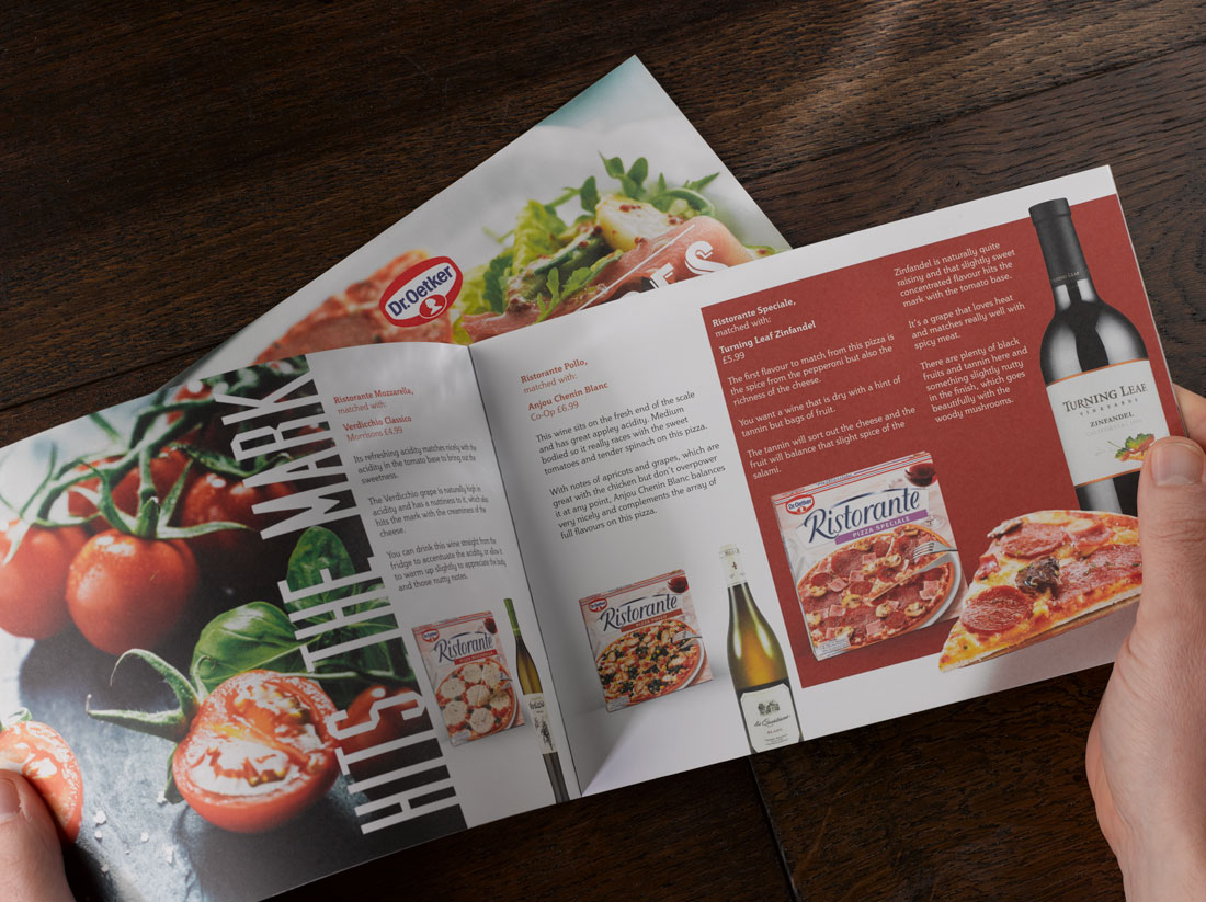 Dr Oetker Pizza and Wine guide photographed on dark wood
